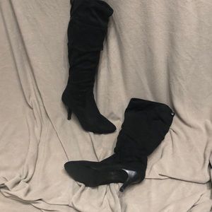 Tall slouchy boots.  Brand unknown